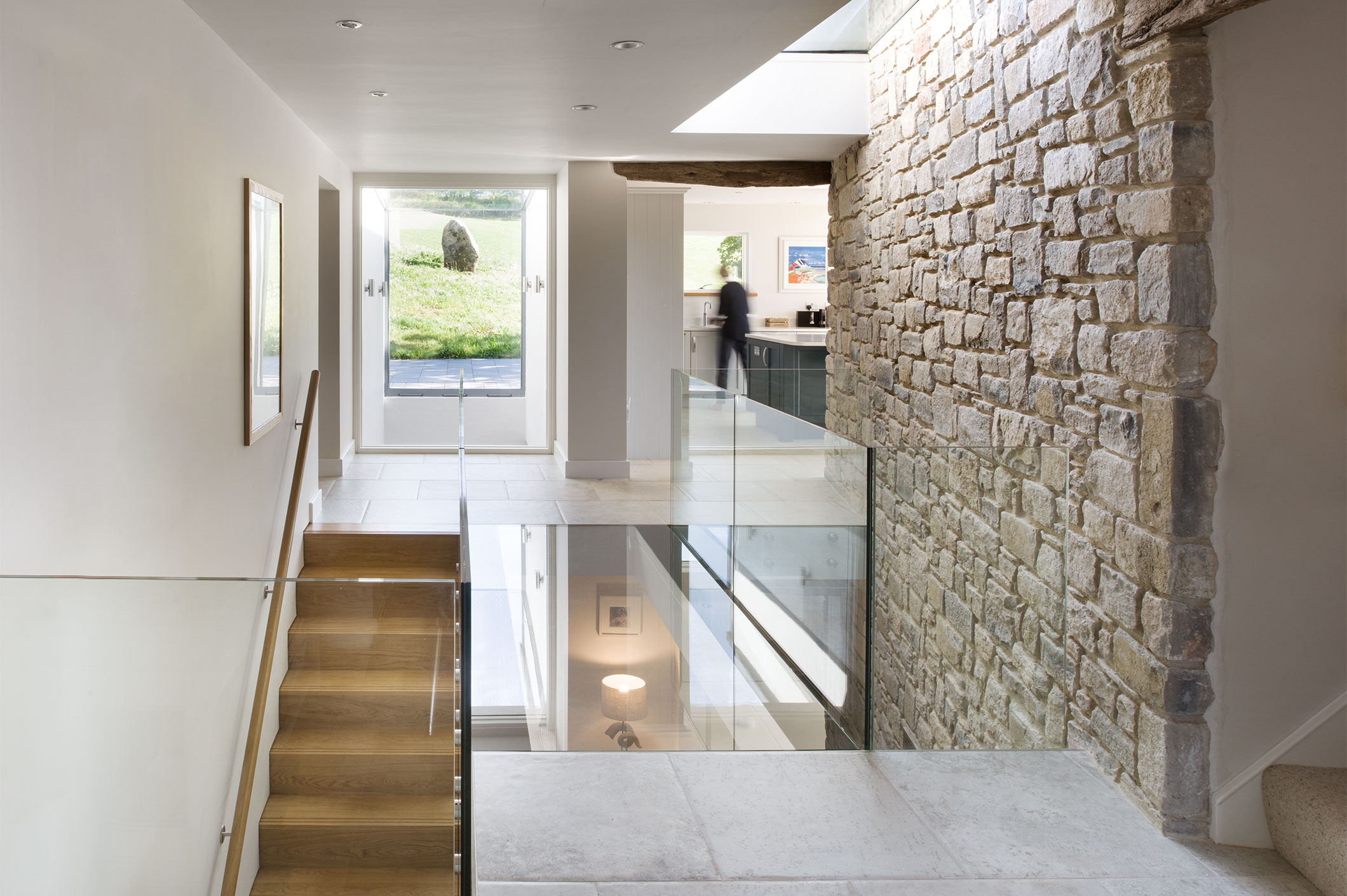 The floors are connected through the light flooded hall
