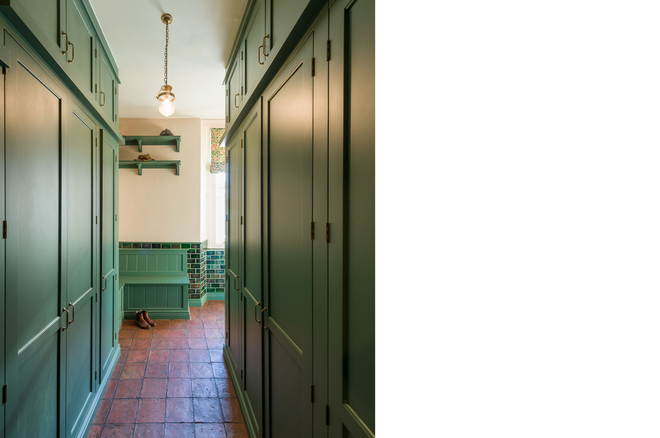 New boot room with essential cupboards and hanging space.
